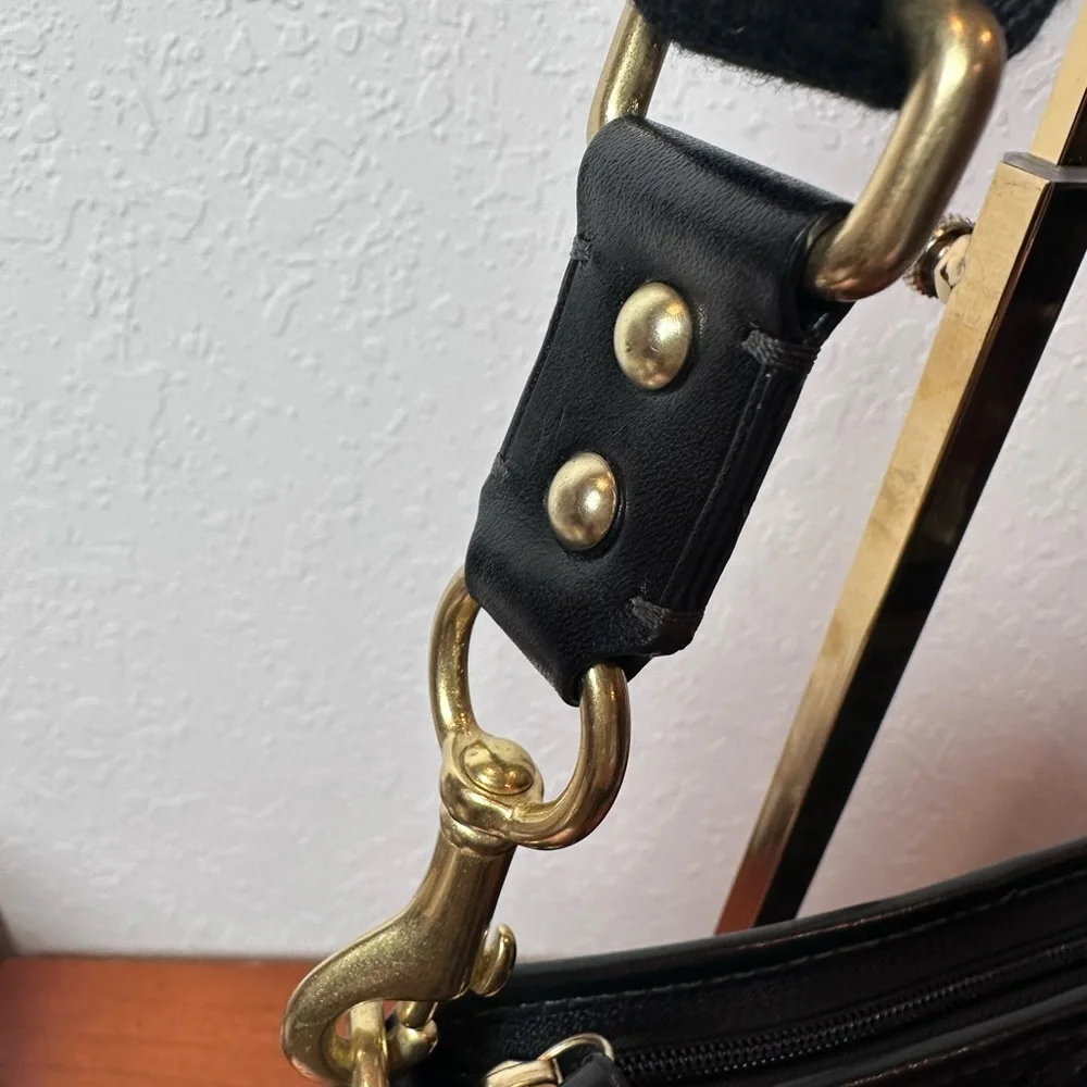 Coach Black Signature Crossbody Bag with brass hardware